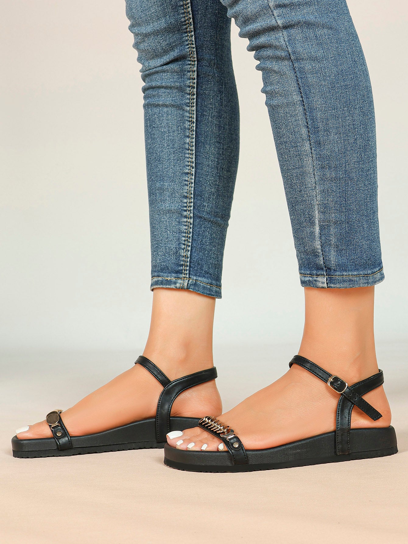 Black Flat Sandals with Gold-Tone Coin Detail and Adjustable Ankle Strap